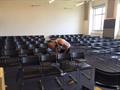 Set up of 300 student tablet arm chairs for temporary classrooms
