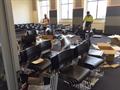 Set up of 300 student tablet arm chairs for temporary classrooms